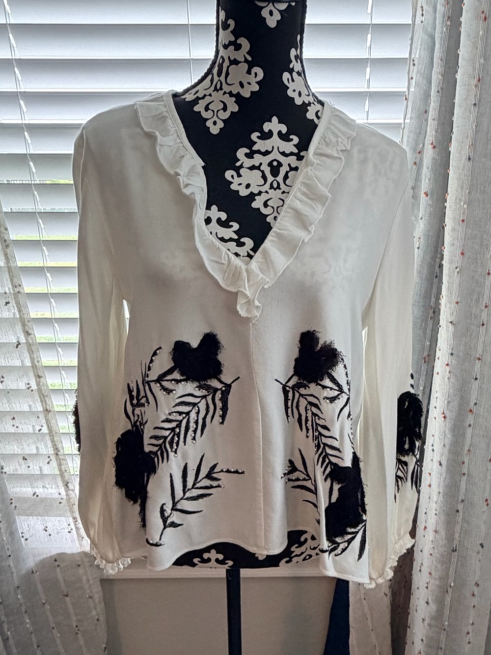 Zara White Ruffle V-Neck Blouse with Black Floral Motif